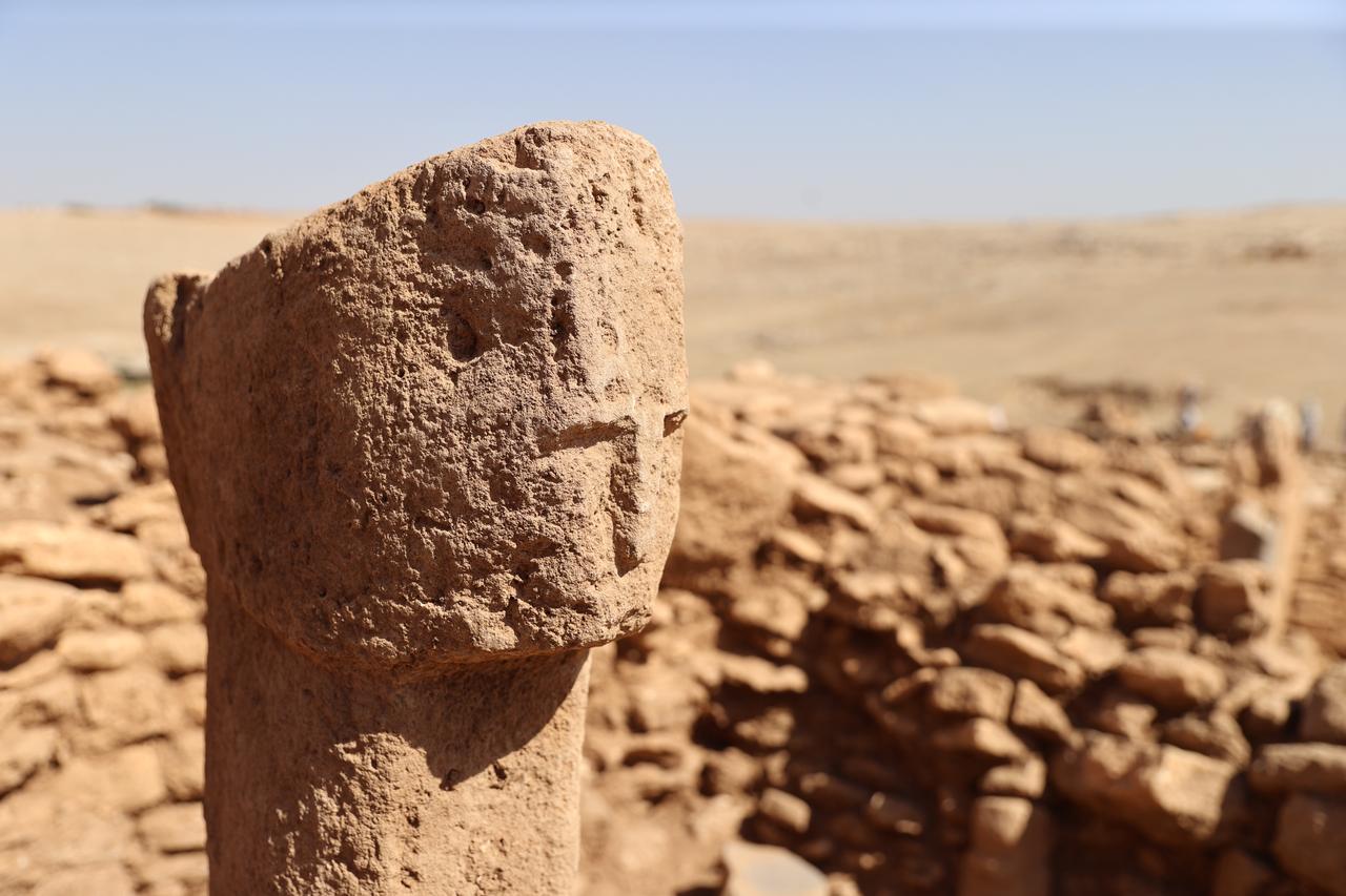 Ancient human-faced pillar discovered at the Karahantepe Neolithic site.